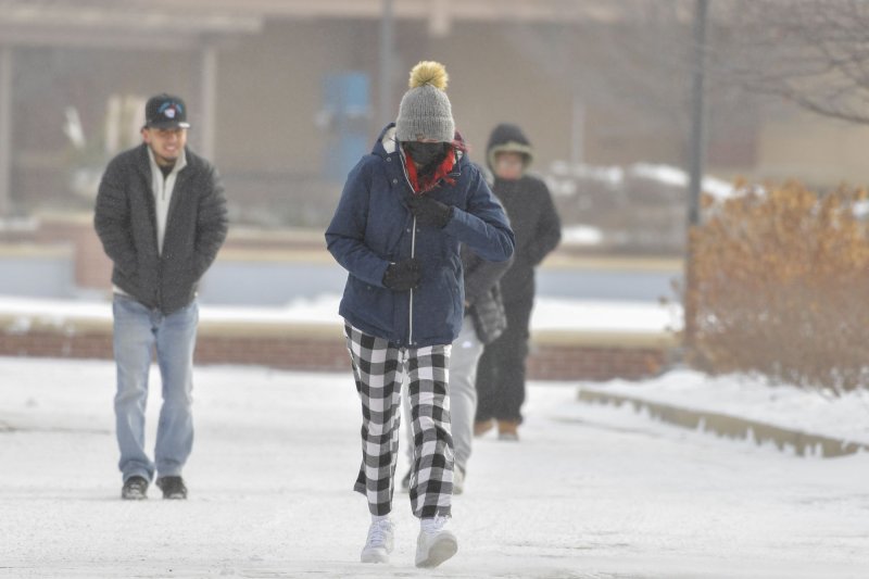 The minus -0 degrees wind chill did not stop shoppers heading out for some last-minute holiday shopping at Chicago Premium Outlets in Aurora, Ill., on Friday. Photo by Mark Black/UPI | <a href="/News_Photos/lp/95cb10bb8c4ecec92f6c2c2a7c35788c/" target="_blank">License Photo</a>