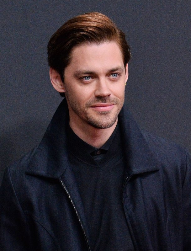 Tom Payne arrives for the 45th annual E! People's Choice Awards at the Barker Hangar in Santa Monica, Calif., on November 10, 2019. The actor turns 40 on December 20. File Photo by Jim Ruymen/UPI | <a href="/News_Photos/lp/bdaec68cd631c13a26c8f295b935cff7/" target="_blank">License Photo</a>