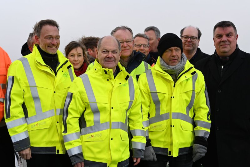(L-R) German Finance Minister Christian Lindner, Chancellor Olaf Scholz and Economy and Climate Minister Robert Habeck attend the opening ceremony of Germany's first LNG (liquefied natural gas) terminal in Wilhelmshaven, Germany, on Saturday. Photo by Lars-Josef Klemmer/EPA-EFE