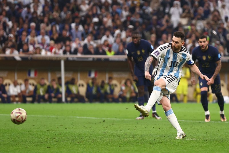 Lionel Messi of Argentina scores the opening goal of a penalty spot at the 2022 FIFA World Cup Final on Sunday at Lusail Stadium in Lusail, Qatar. Photo by Chris Brunskill/UPI | <a href="/News_Photos/lp/1b4854e998f3669143e0914a1fa1d6e4/" target="_blank">License Photo</a>