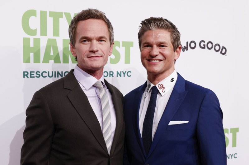 Husbands Neil Patrick Harris (L) and David Burtka shared photos on Instagram Saturday of their recent trip to Disney World with their kids. File Photo by John Angelillo/UPI | <a href="/News_Photos/lp/dee06f8e95a37b17af6e25e1982856b9/" target="_blank">License Photo</a>