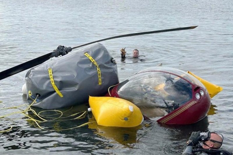 Tampa Bay backup quarterback Blaine Gabbert and the Tampa Police Department Marine Patrol rescued four when a helicopter ditched in Tampa Bay Thursday. Photo courtesy of Tampa Police Department/UPI