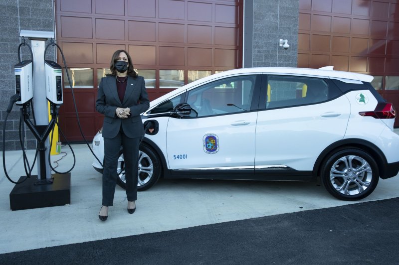 Vice President Kamala Harris stands beside an electric vehicle while receiving a briefing about the Prince George's County electric vehicle fleet, during a visit to Brandywine Maintenance Facility in Brandywine Maryland, on Monday, Dec. 13, 2021. The Treasury Department said Thursday that it was delaying new restrictions for electric vehicle tax credits. Photo by Michael Reynolds/UPI | <a href="/News_Photos/lp/81e9ada7ea41422e811fafe567a9f1f2/" target="_blank">License Photo</a>