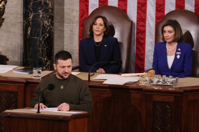 Vice President Kamala Harris (L) and Speaker of the House Nancy Pelosi (R) listen as President Volodymyr Zelensky of Ukraine addresses a joint session of Congress at the U.S. Capitol on Wednesday. Photo by Jemal Countess/UPI | <a href="/News_Photos/lp/62922ffe551c606fa8087803814c76af/" target="_blank">License Photo</a>