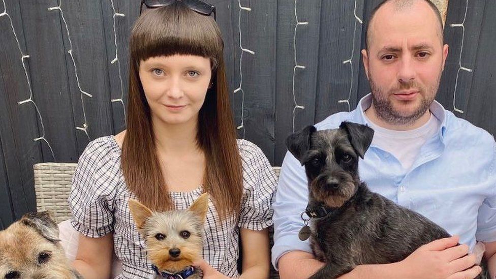 Jasmine Ransome with her husband and their dogs