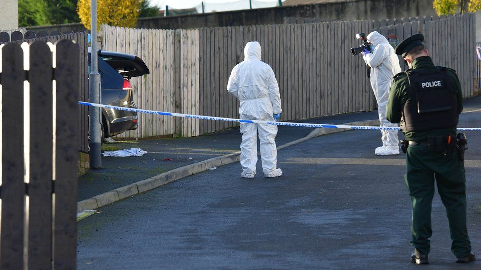 Police and the forensics at the scene in Newry