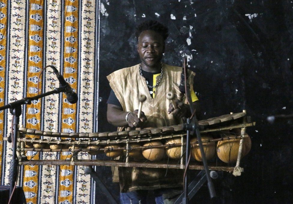 A member of the group of balafonists Keybaphone performs during the 9th edition of the festi Balafon in Abidjan, Ivory Coast, 25 November 2022. The Festi balafon is a festival that is organized every year in Abidjan to promote the Balafon which is one of the oldest instruments played by Griots, who are West African musicians and storytellers who perform at weddings and other ceremonies. The Balafon consists of a series of wooden bars, or keys, resting on a bamboo frame.