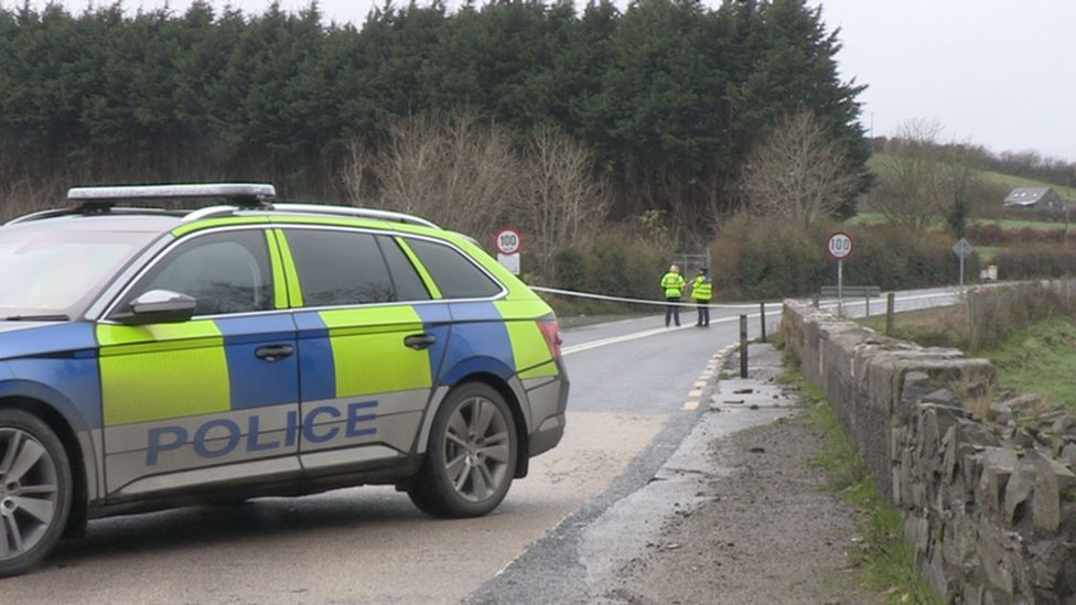 Police on both sides of the border closed the road after the collision