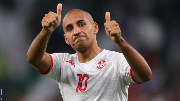 Wahbi Khazri give Tunisia fans the thumbs up after their win over France at the World Cup