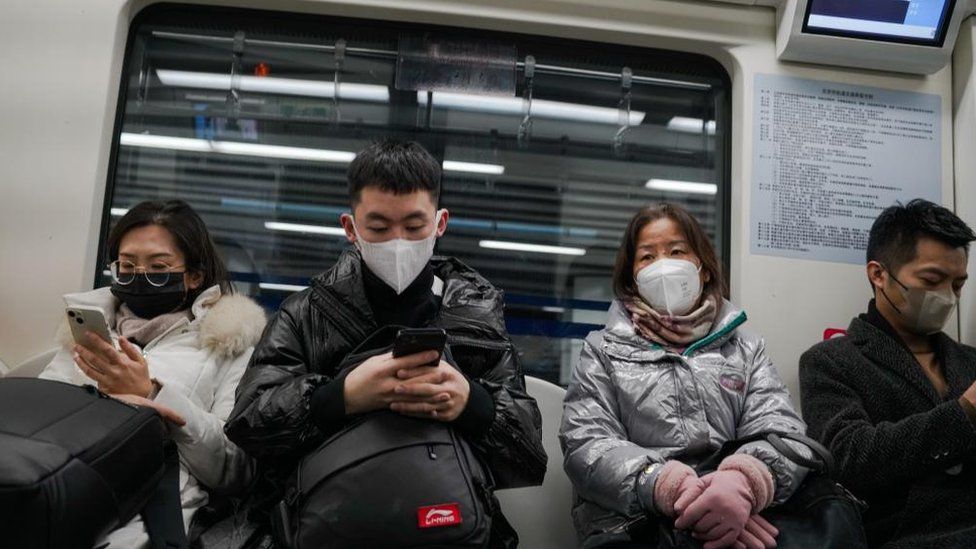 beijingers on train, 05/12