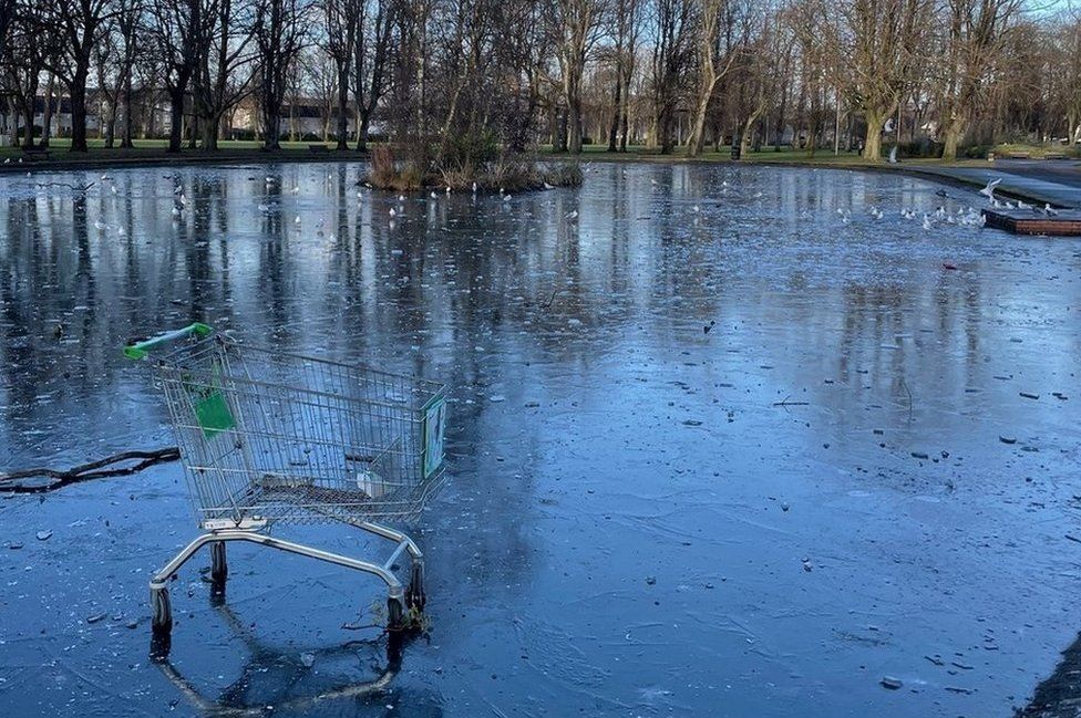 Shopping trolley on ice