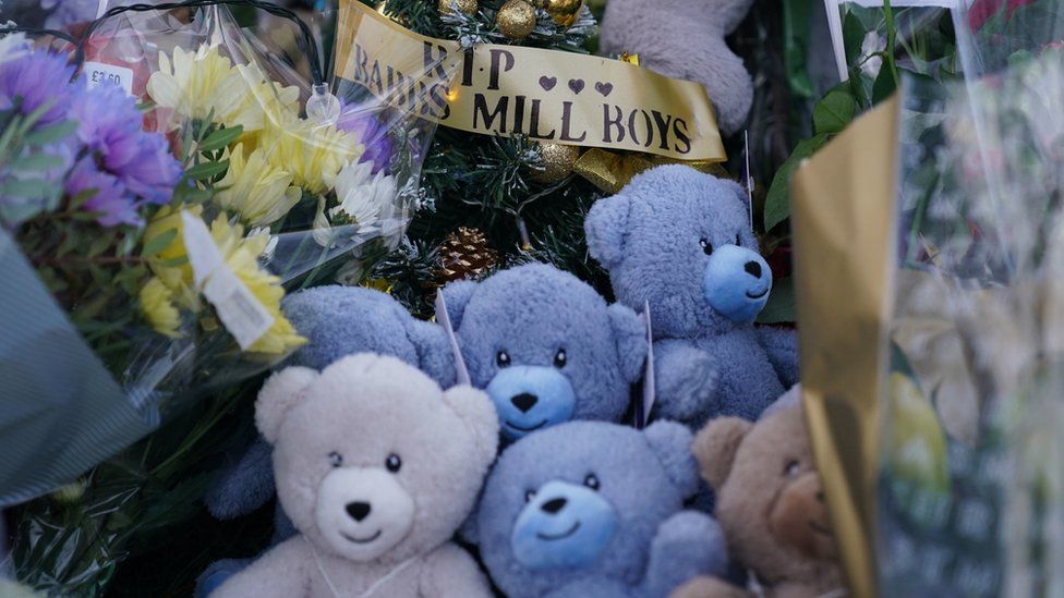 Teddies and a sign saying the Babbs Mill Boys