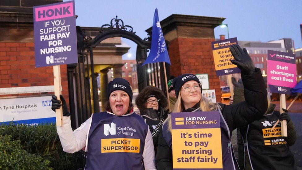 Members of the Royal College of Nursing (RCN) on the picket line outside Royal Victoria Infirmary in Newcastle