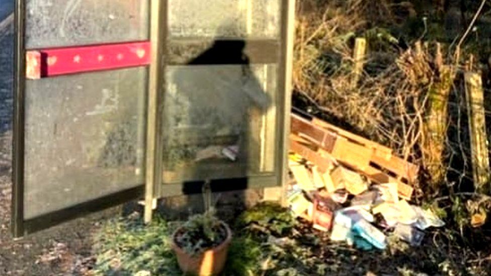 Books dumped at phone box