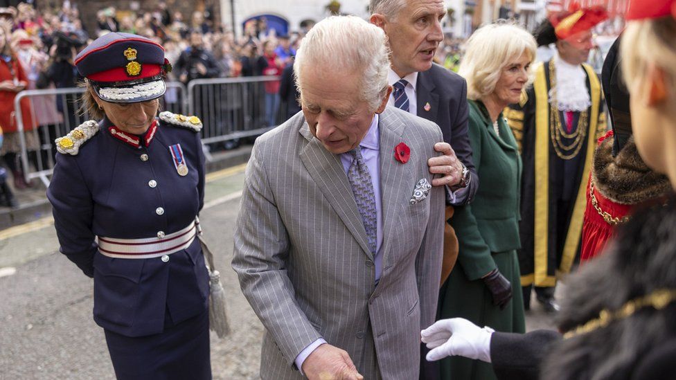 King Charles III reacts after an egg was thrown in his direction as he arrived for a ceremony at Micklegate Bar in York