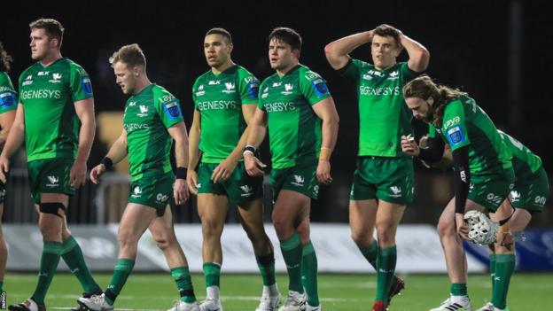 Dejected Connacht leave the pitch after the game