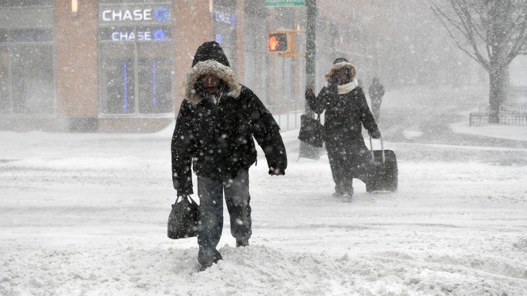 pedestrians stuck in the snow