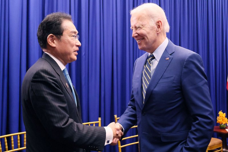 Japan's Prime Minister Fumio Kishida and U.S. President Joe Biden (R) hold a meeting during ASEAN in Phnom Penh, Cambodia on November 13, 2022. Kishida will visit the White House on January 13. Photo by Japanese PM Press Office / UPI | <a href="/News_Photos/lp/178b27914a09bac48bba44cabfbaaf9a/" target="_blank">License Photo</a>