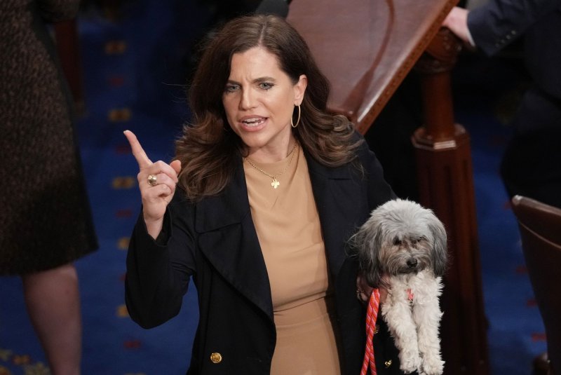 Rep. Nancy Mace, R-S.C., holds her dog after the 11th round of voting for Speaker of the House at the U.S. Capitol on Thursday. Federal judges said Friday her district was racially gerrymandered. Photo by Pat Benic/UPI
