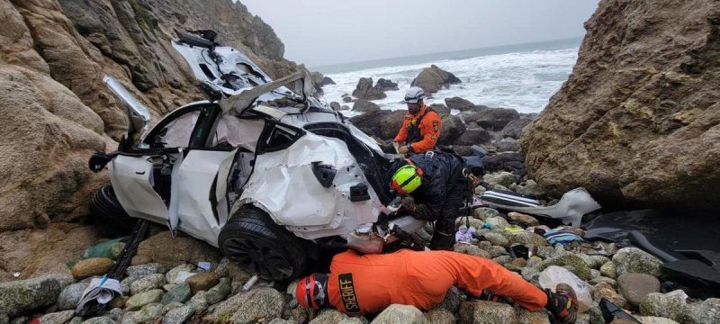 Responders rescued four people from a Tesla that drove off a cliff in California on Monday. On Tuesday, they announced charges against the driver for attempting to murder his family. Photo courtesy of San Mateo County Sheriff's Office/<a href="https://www.facebook.com/SMCSheriff/posts/pfbid0RfcyEGRhquf3MC6o7Yse9WF7B4Q12Njcz6NQSdXKkByzn1W27dnwR1EKZBZFCchfl?__cft__[0]=AZWYELolvYwbkN0ogAIrE4ElOO1s3yBcuJHlxp9_9_bNYTyRY8062d0eQq6CeVUexz0UgdP4SAuW4TpyTsXb8Rr3r1ISNm58hpqGbyDD2QmRmAkkhRXWltpGnbEejX2GxTwi7BvqNwjXVW60oaFW-dfoxh4vJGriB4Pic7SqsG8tDXfMulnIErhNiXsE0ZWfihg&amp;__tn__=%2CO%2CP-R">Facebook</a>