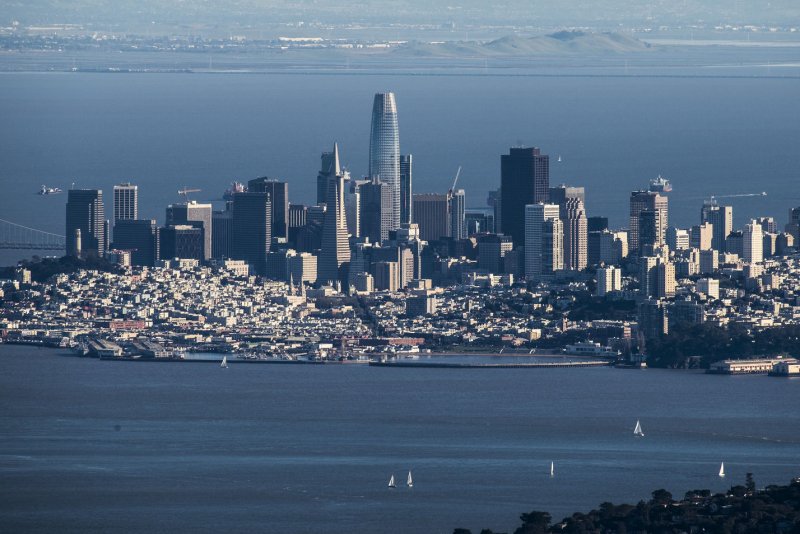 San Francisco's skyline is dominated by the 1,070-foot Salesforce Tower as viewed from the top of Mount Tamalpias in Marin County, California. The company said it may have over-hired and is now looking to trim payrolls. File photo by Terry Schmitt/UPI | <a href="/News_Photos/lp/bee8efb3b8f04264ddd55fc02d5b1602/" target="_blank">License Photo</a>
