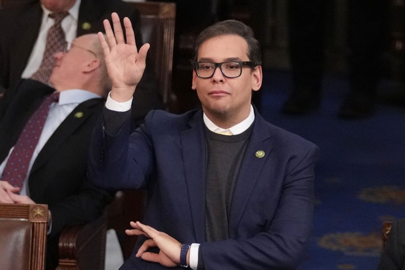 Rep-elect George Santos, R-NY, raises his hand to vote for Rep. Kevin McCarthy, R-CA, for Speaker of the House at the U.S. Capitol in Washington, DC on Thursday. Photo by Pat Benic/UPI