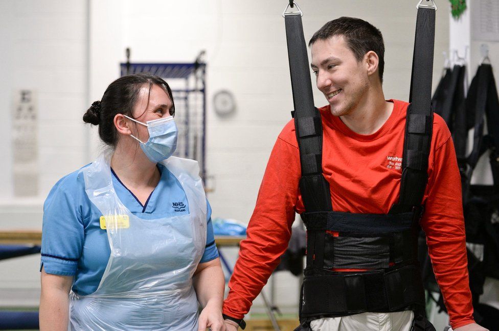 Luke Louden on the ZeroG Gait and Balance System, pictured with physiotherapist Claire Lincoln