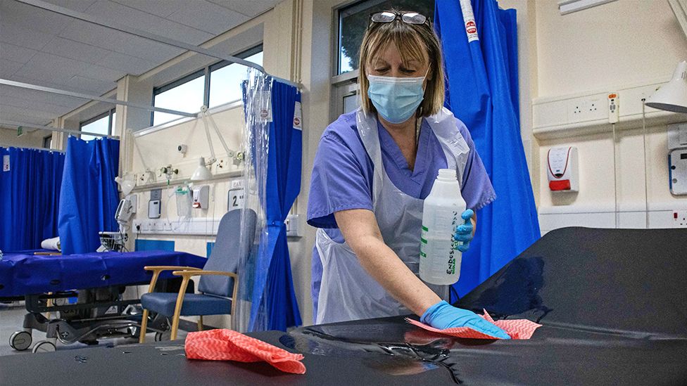 A nurse sterileses a short stay bed after a patient has been discharged on March 18, 2021 in Abergavenny, Wales, United Kingdom