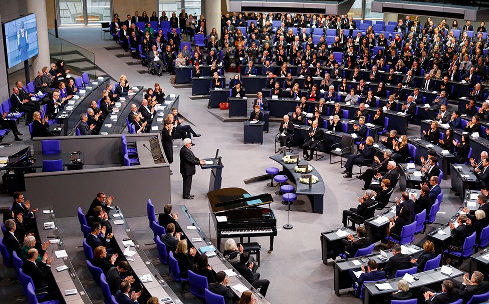 Klaus Schirdewahn, a representative of the queer community, speaks during a memorial ceremony commemorating the victims of the Holocaust at the lower house of the parliament or Bundestag, in Berlin, Germany, on 27 January 2023