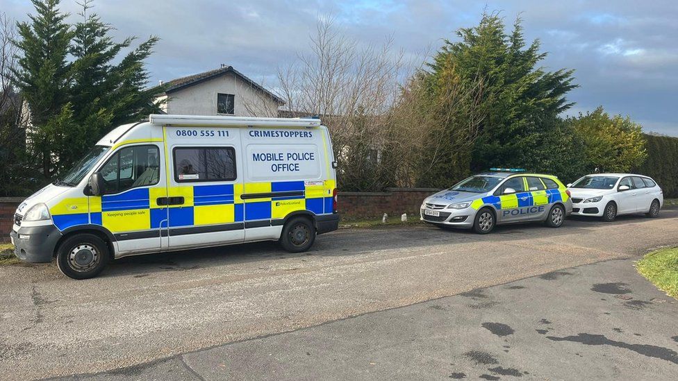 Police vans at Kippford