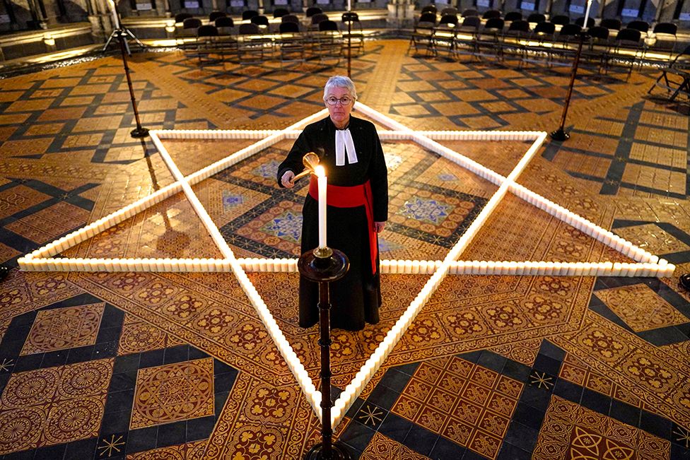 On Wednesday in York, England, the Reverend Canon Maggie McLean, Canon Missioner at York Minster lit one of 600 candles shaped as a Star of David on the floor of the Chapter House of York Minster on 25 January 2023