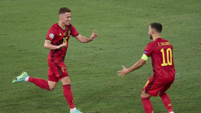 SEVILLE, SPAIN - JUNE 27: Thorgan Hazard of Belgium celebrates after scoring his team's first goal with his teammate Eden Hazard during the UEFA Euro 2020 Championship Round of 16 match between Belgium and Portugal at Estadio La Cartuja on June 27, 2021 i Image credit: Getty Images