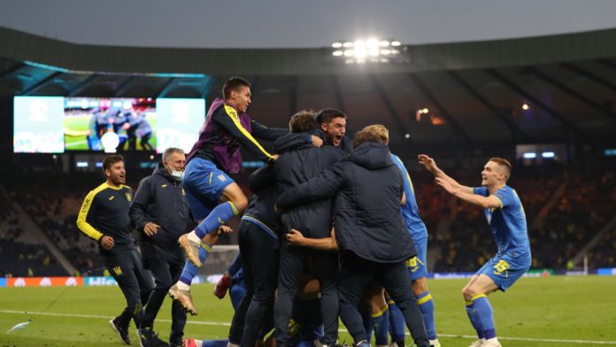GLASGOW, SCOTLAND - JUNE 29: Artem Dovbyk of Ukraine (obscured) celebrates with team mates after scoring their side's second goal during the UEFA Euro 2020 Championship Round of 16 match between Sweden and Ukraine at Hampden Park on June 29, 2021 in Glasg Image credit: Getty Images