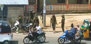 Military Officers assaulting Wa residents