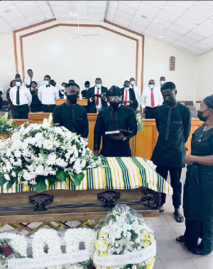 Keche Andrew and his siblings paying their last respect to their father