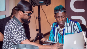 Dancehall artiste, Shatta Wale with music producer, Mix master Garzy