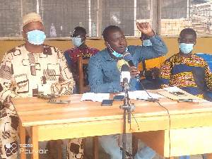 Nana Kumanini (middle) stressing a point at a news conference