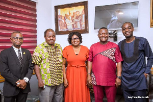 Gayheart Mensah (second from right) in a group photo during one of his visits to a media house