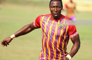 Hearts have re-signed former striker Kofi Kordzi