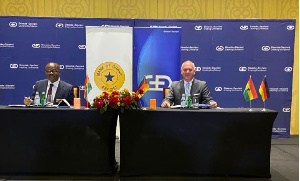 BoG Governor, Dr Ernest Addison, and the CEO of Giesecke+Devrient, Dr. Wolfram Seidemann