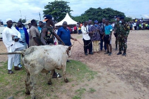 The military team emerged winners and were given a cow as their prize
