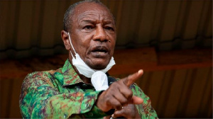 A video showed Guinea's President Alpha Condé in the hands of soldiers