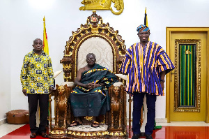 Otumfuo Osei Tutu II and Sports Minister Mustapha joined by a rep
