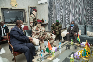 Ouattara (left) and Akufo-Addo conferring with Doumbouya in Conakry