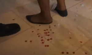 Blood stains on the floor at the YEA job fair at AICC