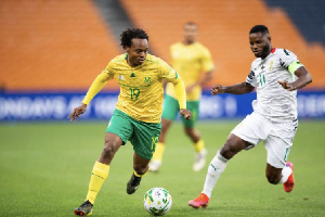 South Africa forward Percy Tau and Black Stars midfielder, Mubarak Wakaso