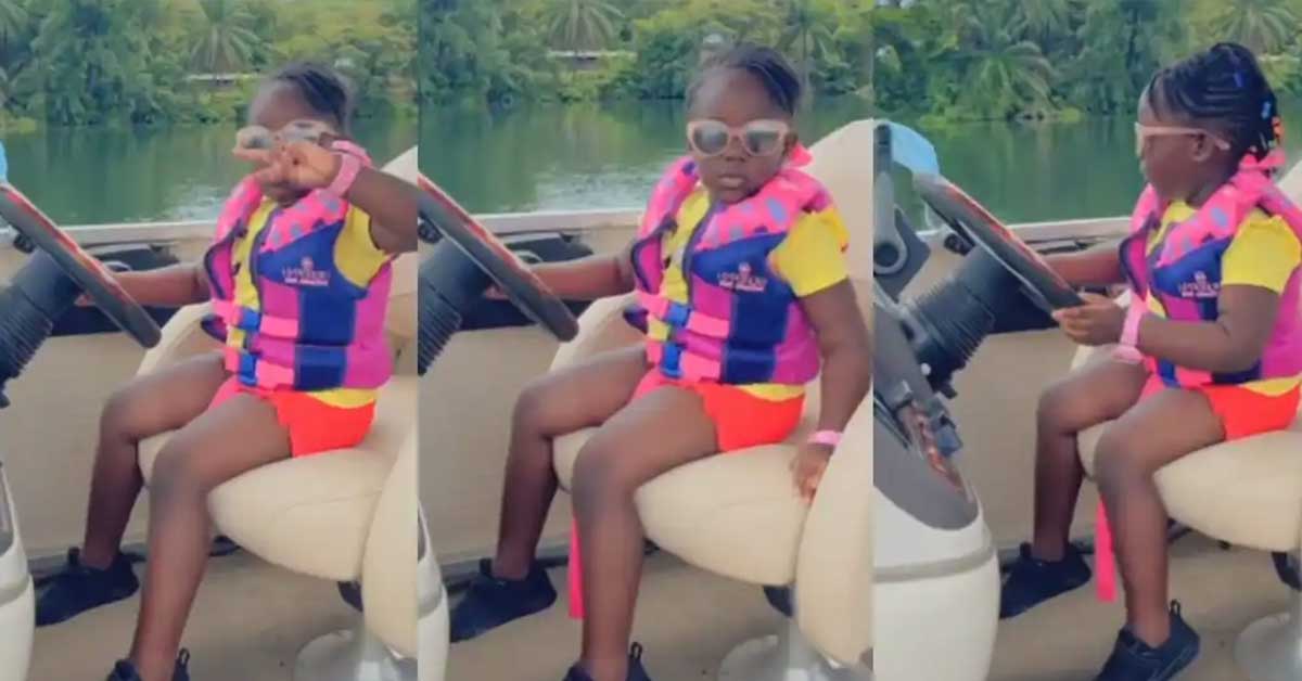 (+VIDEO) Stonebwoy’s daughter Jidula shows boldness as she is captured driving a boat across the Volta Lake
