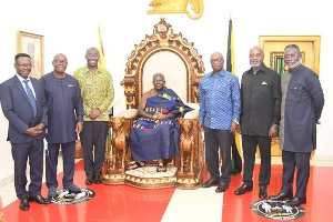 Asantehene, Otumfuo Osei Tutu II and a delegation from Rocksure International in a group picture