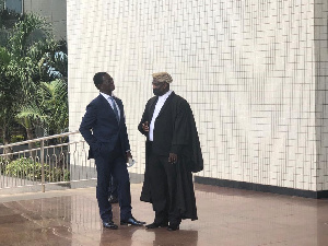 Dr. Stephen Kwabena Opuni and his lawyer