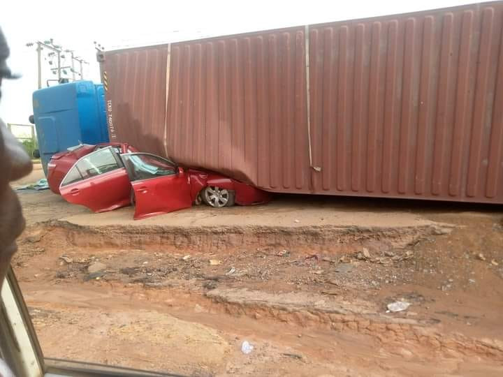 Occupants escape unhurt as container falls on vehicle in Nigeria